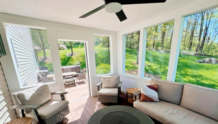 3_season_addition_gerding_construction 3 season furnished room with lots of big windows and ceiling fan