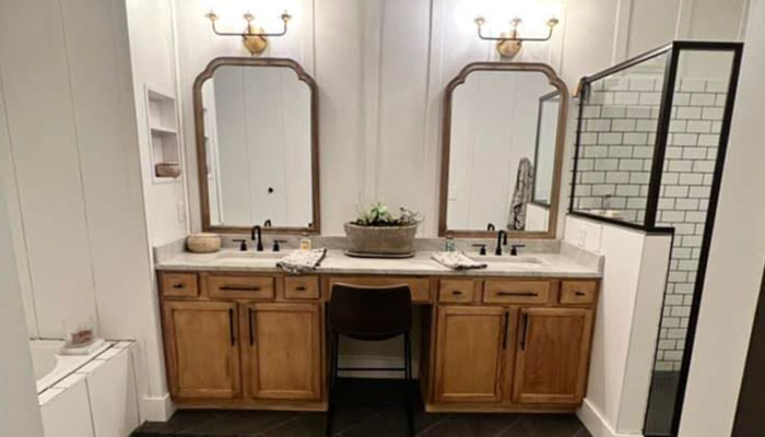 Gerding_Construction_bathroom_remodel_ohio modern remodeled bathroom with 2 sinks medium wood subway tile